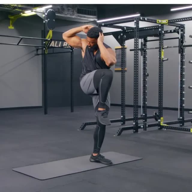 Standing Elbow-to-Knee Crunches