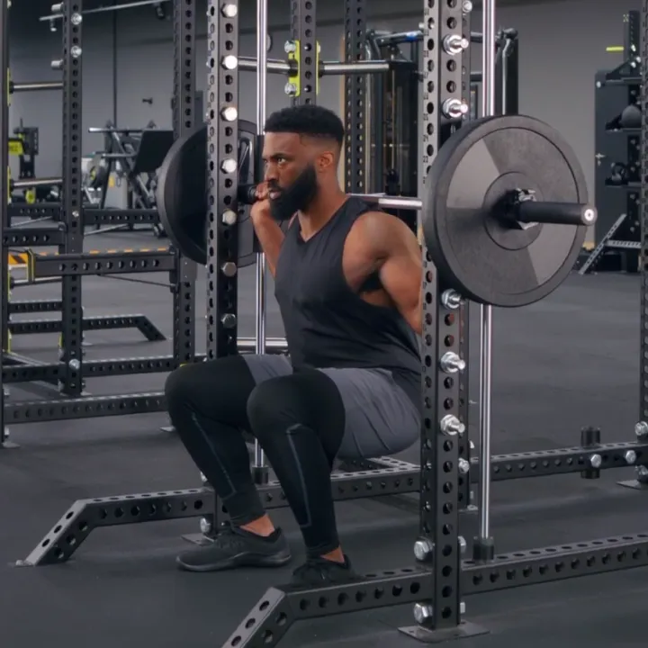 How to Do Smith Machine Squats: Video, Form, Muscles Worked, Tips ...